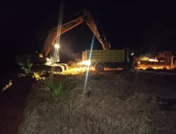 Satgas TMMD dan Warga Lembur Malam Kejar Pembangunan Jalan
